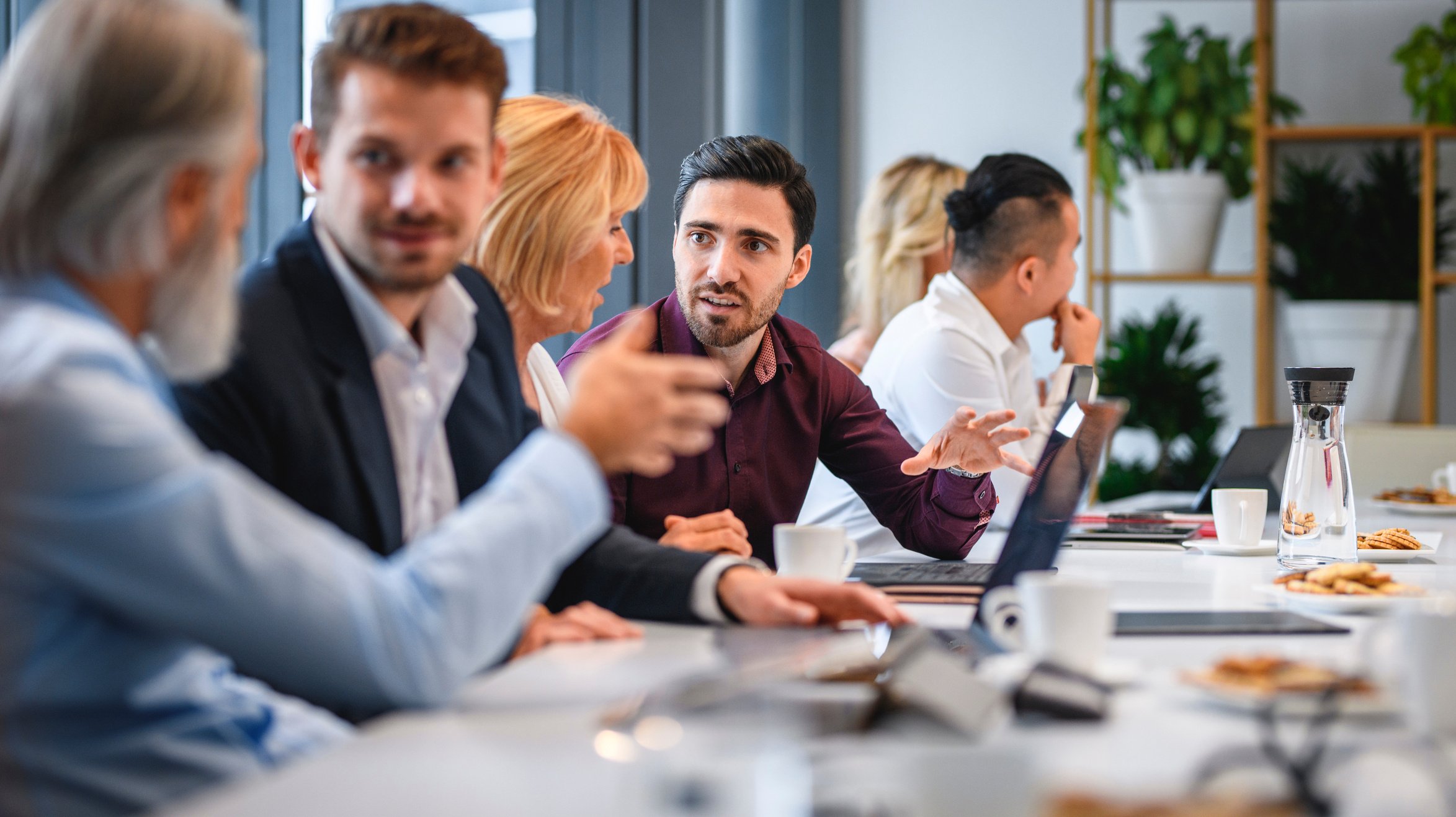 Executive Team Members Debating Meeting Ideas